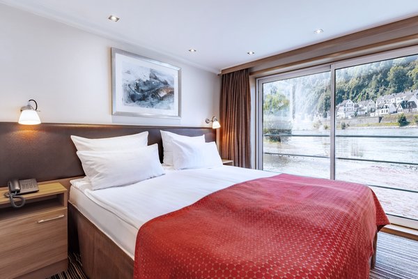 Inside view of the cabins in category C and D on the A-ROSA ALEA with french balcony.