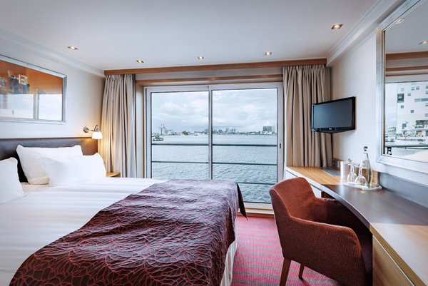 Inside view of the cabins in category C and D on the A-ROSA CLEA with french balcony.